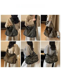 Detail view of stylish leopard print canvas tote bag with adjustable wide shoulder straps