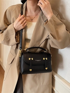 Classic black litchi pattern leather crossbody bag with elegant gold hardware for women