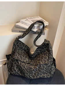 Classic leopard print canvas hobo bag with adjustable wide shoulder strap for women