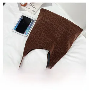 Flat lay of leopard print tote bag with soft suede texture and large capacity for daily use