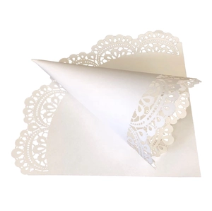 White laser cut lace paper cones for wedding confetti or party favors decoration