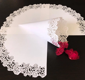 Laser cut white rose lace paper cones and decorative doilies for wedding party confetti
