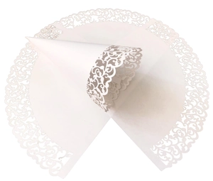 Detailed laser-cut hollow lace patterns on a white wedding confetti cone of art paper