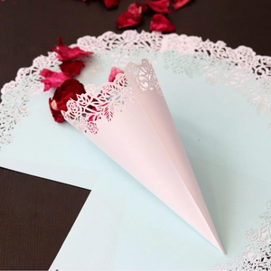 White laser cut wedding paper cones with rose lace pattern for petals and confetti
