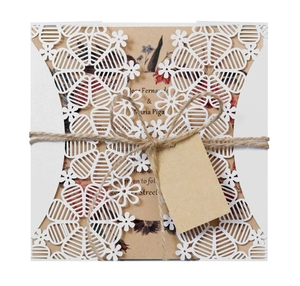 Laser cut lace wedding invitation card with kraft paper floral insert and rustic jute twine