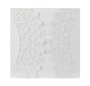 Elegant white laser-cut floral wedding invitation card with intricate paper lace design