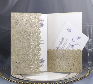 Champagne gold laser-cut floral wedding invitation set with glitter finish and inner cards