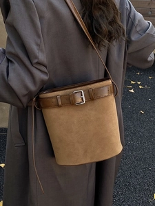 Chic khaki suede bucket bag with leather belt buckle detail for daily commute