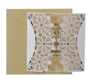 Laser cut floral wedding invitation set with translucent insert and kraft envelope