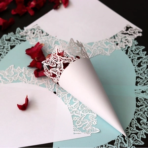 Laser cut white butterfly paper wedding petal cones for romantic celebration events