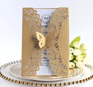 Elegant gold laser cut wedding invitations with 3D butterfly decoration and floral pattern