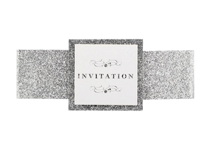 Silver sequin invitation belly band with white art paper and floral engraving pattern
