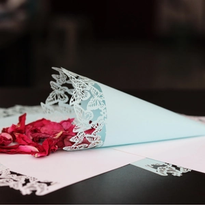 Light blue laser-cut confetti cone with butterfly hollow pattern for wedding party decor