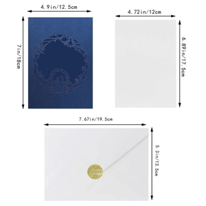 Laser-cut floral wedding invitation set with navy sleeve, blank insert and envelope