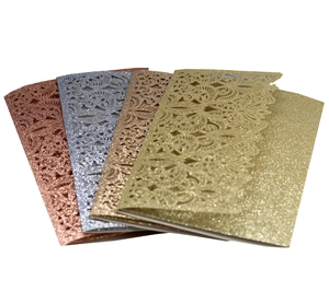 Laser cut glitter paper invitations in rose gold silver and bronze for weddings