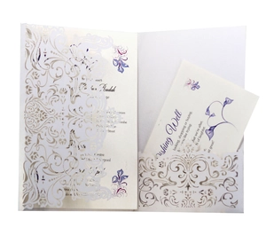 Elegant laser cut floral wedding invitation suite with purple floral inserts and white sleeve