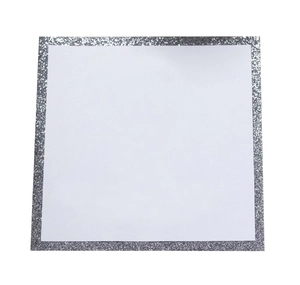 Close-up of square invitation card with silver glitter borders and white blank center