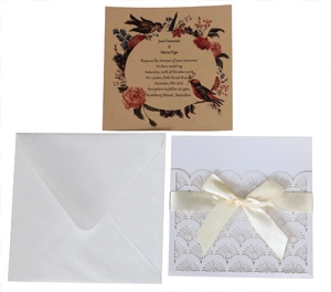 Lace laser cut wedding invitation with ribbon bow and floral inner card set