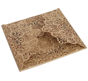 Intricate laser-cut floral patterns on craft paper wedding invitation pocket cover