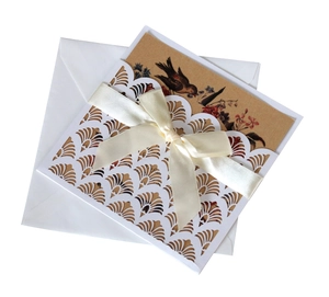 Laser cut lace wedding invitation set with cream silk bow and floral insert card
