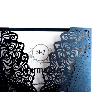 Laser-cut floral wedding invitation card with navy blue and black pearlescent finish