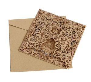 Laser cut kraft paper wedding invitation set with floral mandala sleeve and envelope
