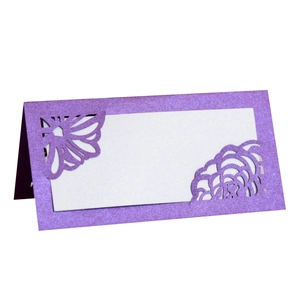 Elegant purple laser-cut floral place cards for wedding seating and party table decor