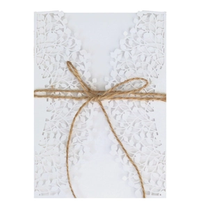 Laser cut leaf wedding invitation with rustic twine and white hollow vine texture