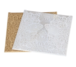 Laser-cut floral wedding invitation cards in white and brown kraft paper styles