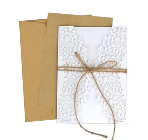 Laser-cut leaf wedding invitation with kraft envelope and natural twine tie