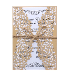 Laser cut leaf wedding invitation set with kraft paper cover and twine bow tie