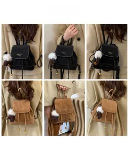 Detail shots of black and brown drawstring backpacks with pompom charms and gold hardware