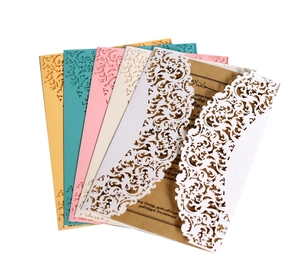 Intricate laser-cut lace invitation cards in five colors with vintage kraft paper inserts