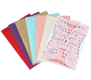 Laser-cut floral wedding invitations in various colors with elegant lace hollow patterns