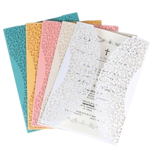 Laser cut floral wedding invitations in various colors like mint green and white
