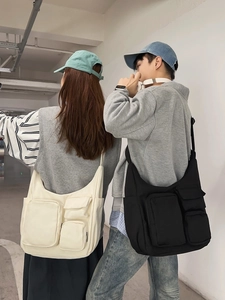 Versatile large capacity canvas messenger bags in black and beige with multi-pockets