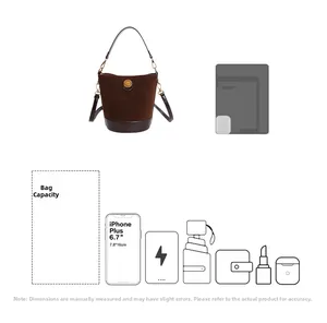 Spacious dark brown suede bucket bag interior holding phone, wallet and accessories