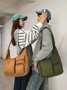 Minimalist canvas tote bag with functional multi-pockets in mustard and olive green