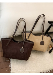 Detail showing two large capacity retro suede tote bags in brown and apricot yellow colors