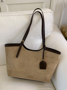Vintage khaki suede tote bag with dark brown leather straps and gold hardware details