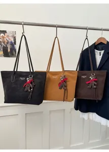 Detailed close-up of retro large capacity tote bags in black, khaki, and brown suede