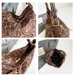 Detail view of leopard print tote bag featuring gold hardware and leather shoulder straps