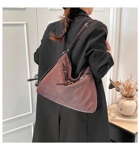 Deep brown suede hobo tote bag shown from behind to display large capacity and soft drape