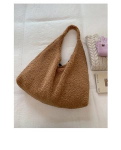 Detail view of the soft lamb wool texture on this large brown shoulder tote bag