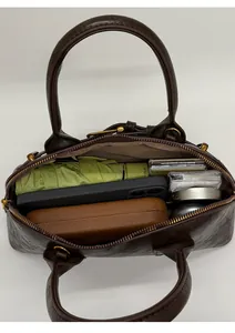 Deep brown shell bag with large capacity, featuring lychee texture and inner lining