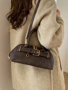 Minimalist dark brown leather handbag with vintage buckle and adjustable shoulder strap