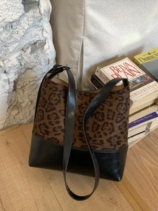 Vintage leopard print crossbody bucket bag with brown faux suede and black leather accents