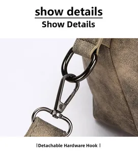 Detail of dark brown retro leather texture and detachable gunmetal hook hardware
