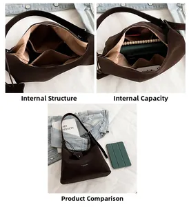 Detail view of large capacity dark brown hobo bag interior with pockets and notebooks