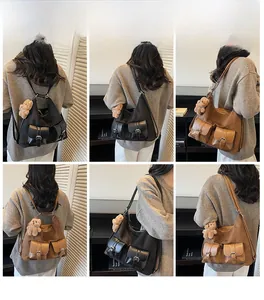 Detail shots showing the versatile multi-pocket canvas and leather backpack worn as a tote bag